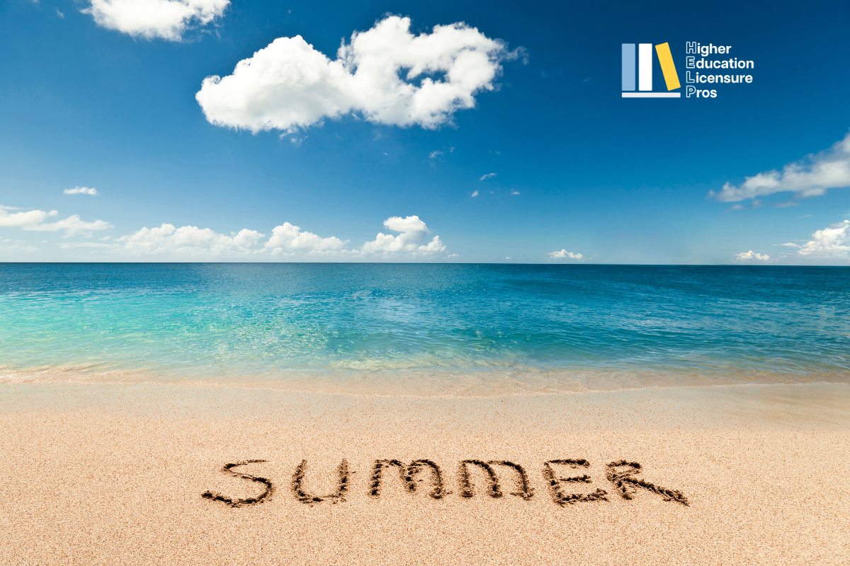 Beach with the word Summer written in the sand